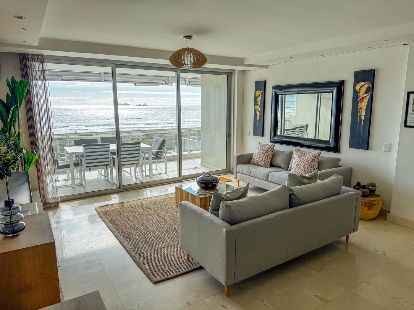 Living room and beachfront view at Dolphin Beach